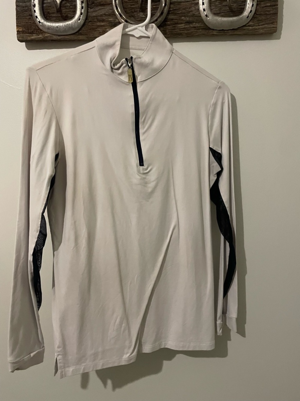 Tailored sportsman quarter zip sun shirt.